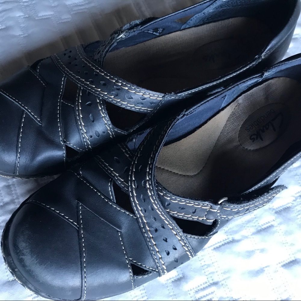 Clark’s navy slip on shoes